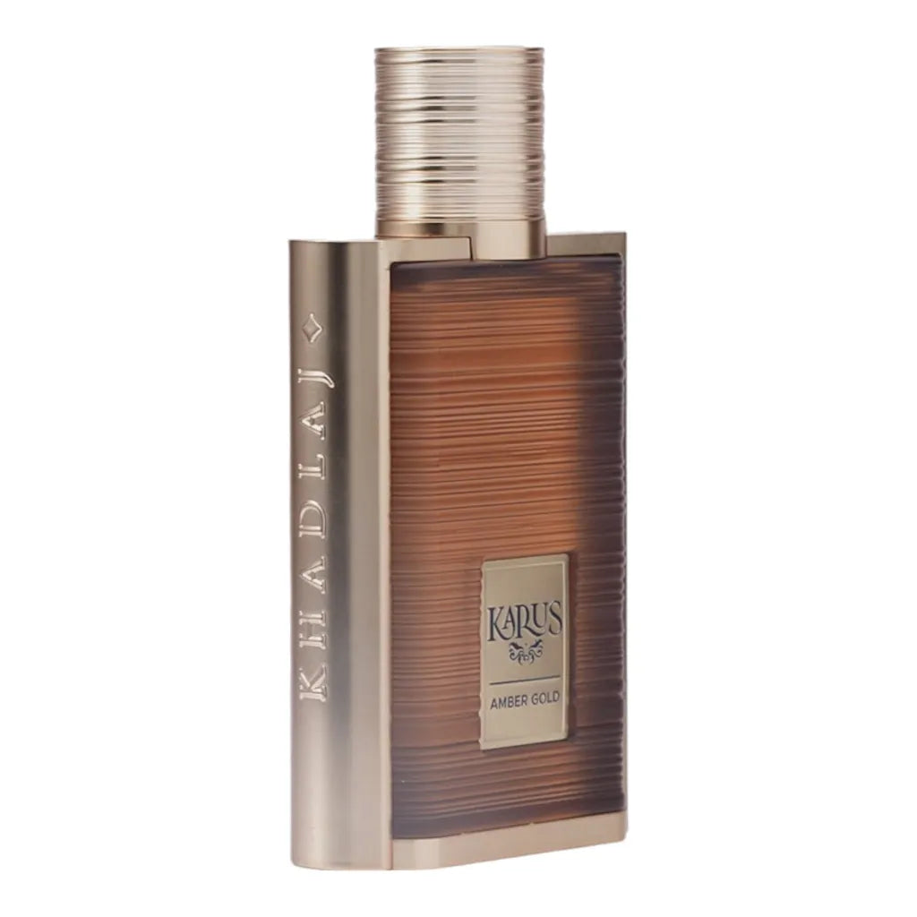 Karus Amber Gold 100ml EDP by Khadlaj – luxurious oud floral perfume with blackcurrant, jasmine, patchouli, and incense in a gold glass bottle.

