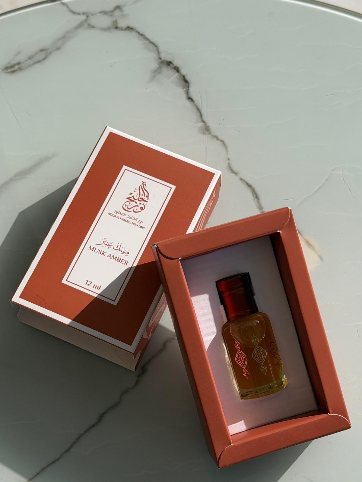 Noor Alkhaleej Musk Amber 12ml concentrated perfume oil with terracotta gift box